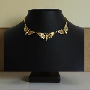 NWT antique gold tone Deaths Head Moth necklace new with tags goth horror